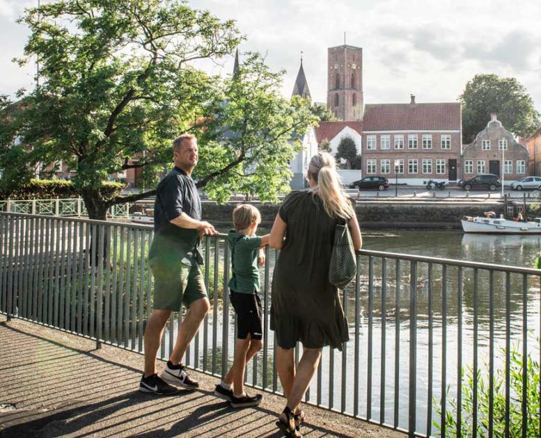 Couple looking at Ribe Cathedral | By the Wadden Sea