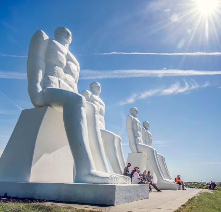 Man Meets the Sea in sunshine | By the Wadden Sea